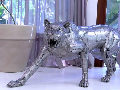 A escultura Onça no programa 